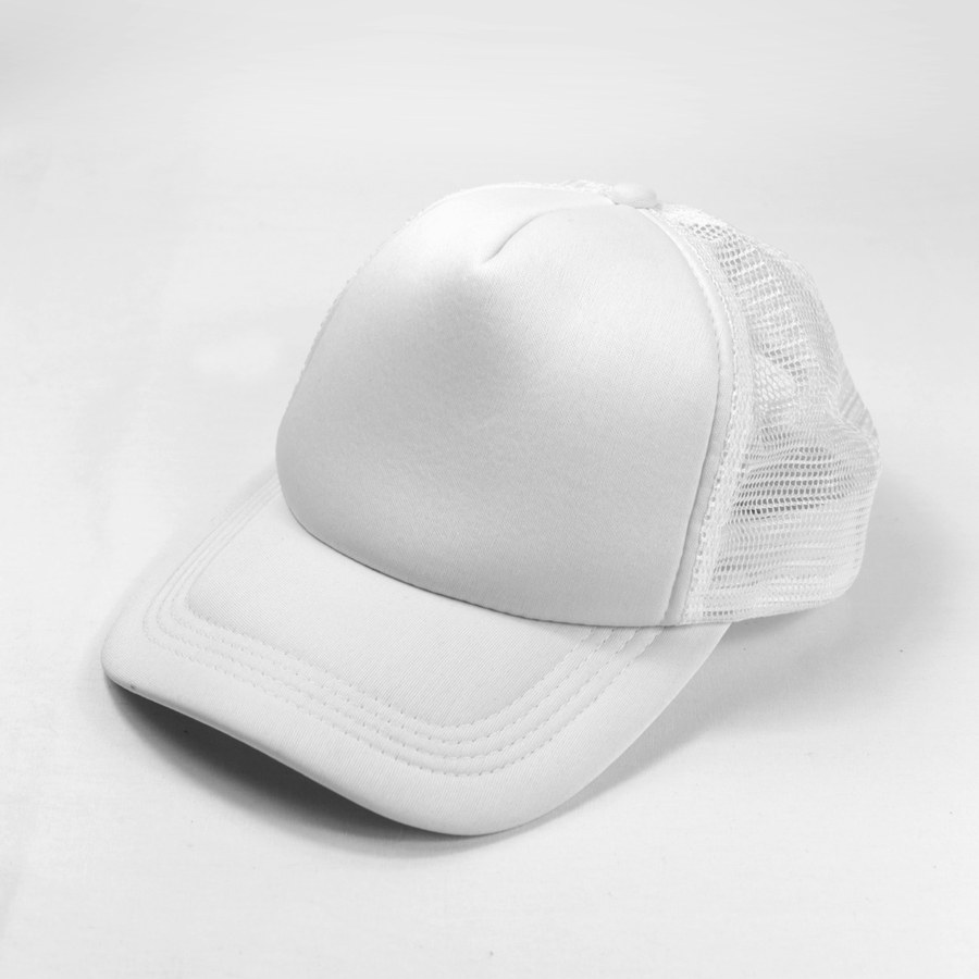 an unbranded white mesh-back trucker cap on a pale surface